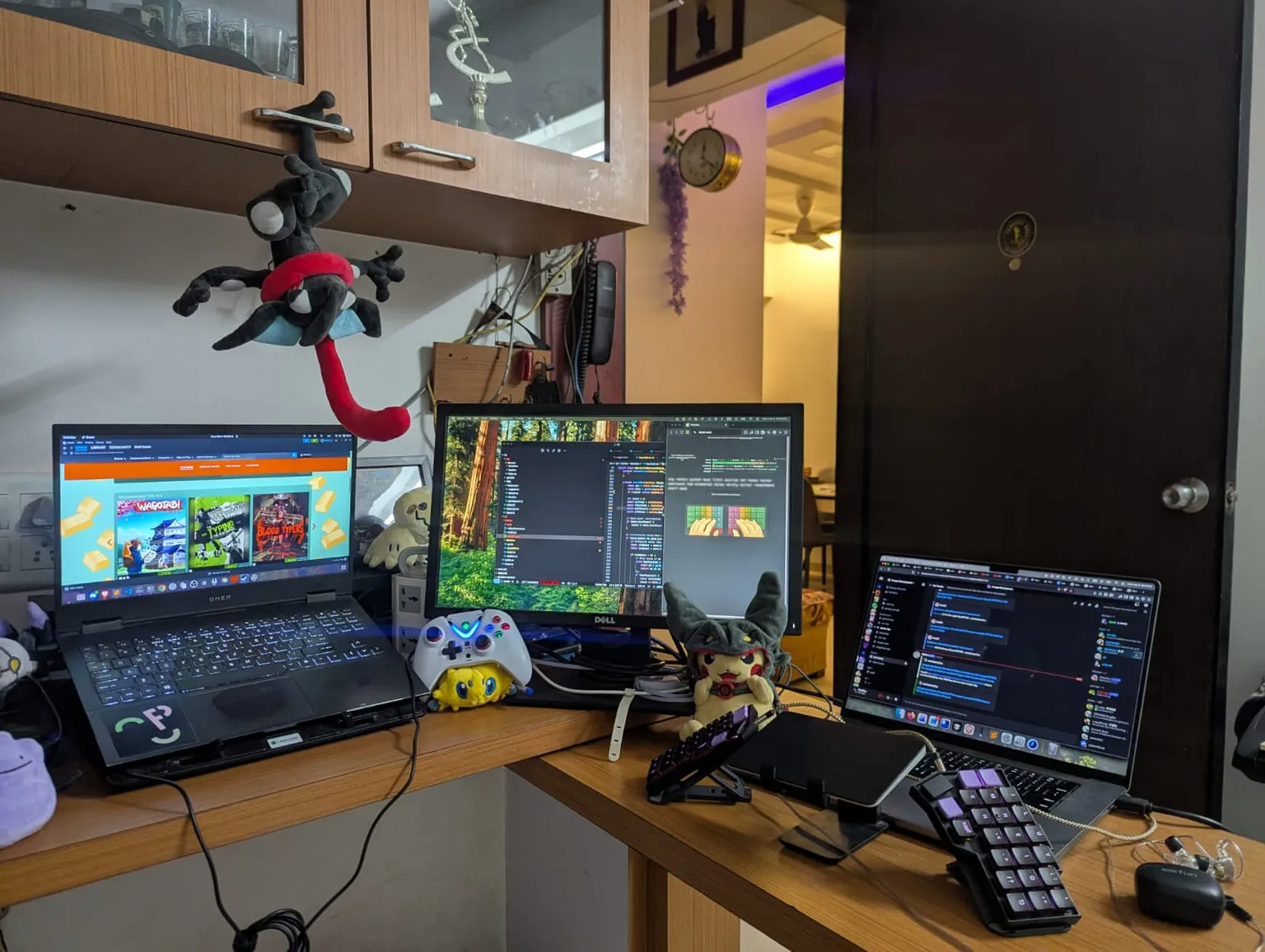 A couple phone stands being used to hold up the keyboard