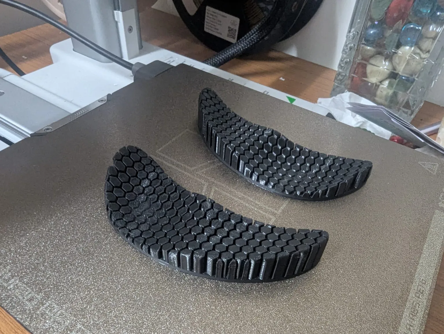 A pair of freshly-printed wrist rests